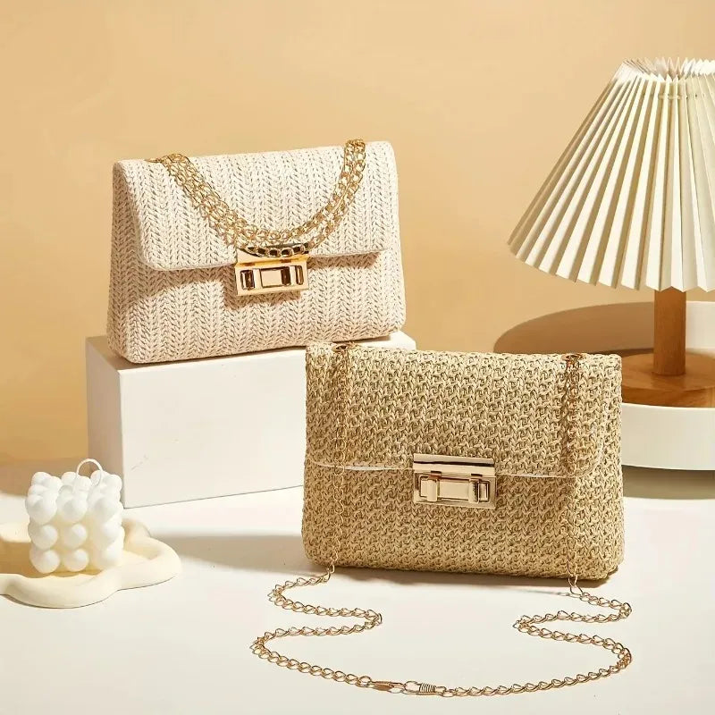 Two straw handbags with gold chains on a beige background