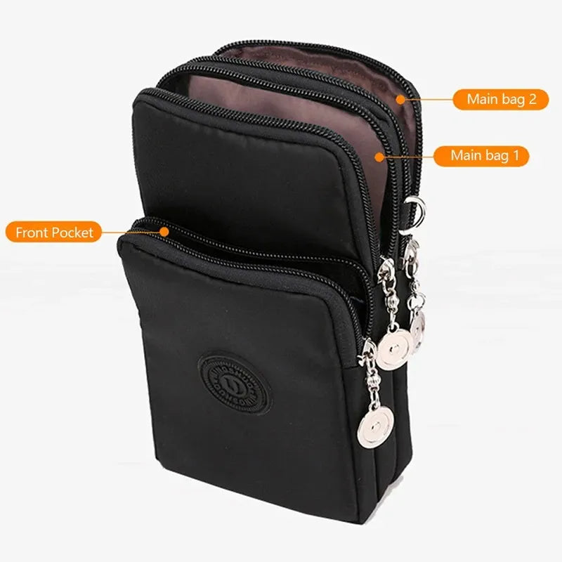 Black multi-pocket bag with keychain on a white background