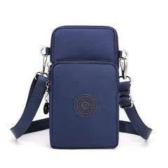 Navy blue crossbody bag with a visible brand logo on a white background